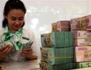 Lãi suất tăng, USD xuống giá